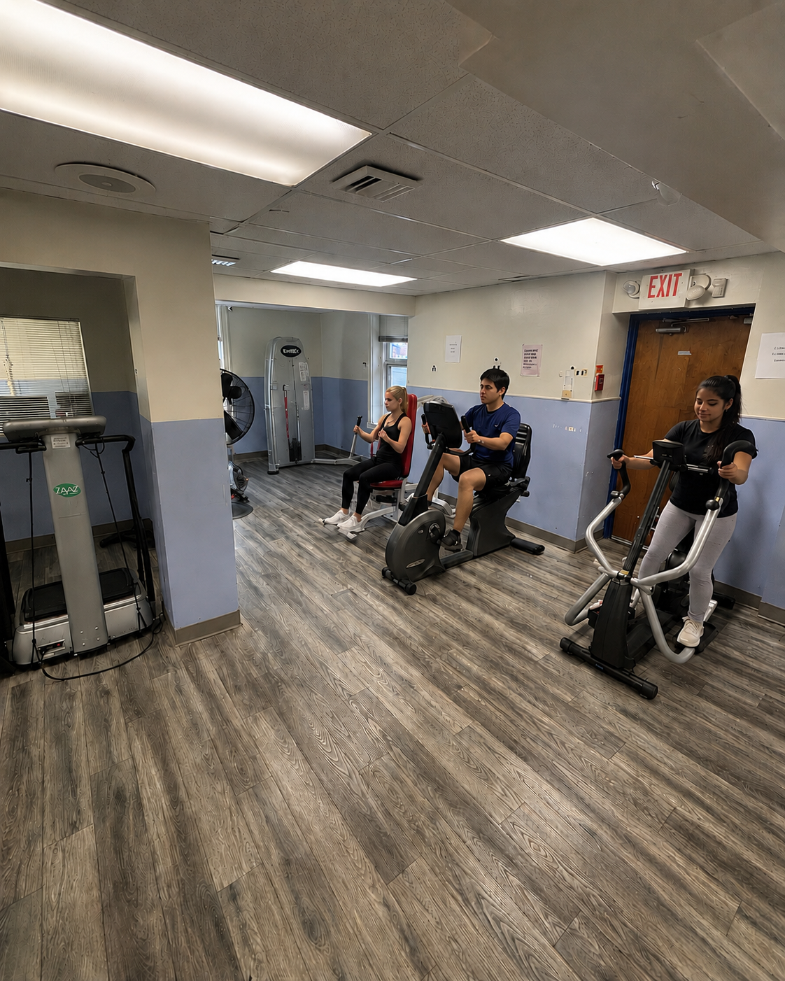 Patients exercising on the rehabilitation gym floor at Sky Medical in Germantown, Philadelphia